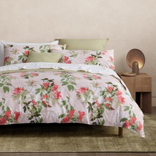 a botanical bedding set on a bed