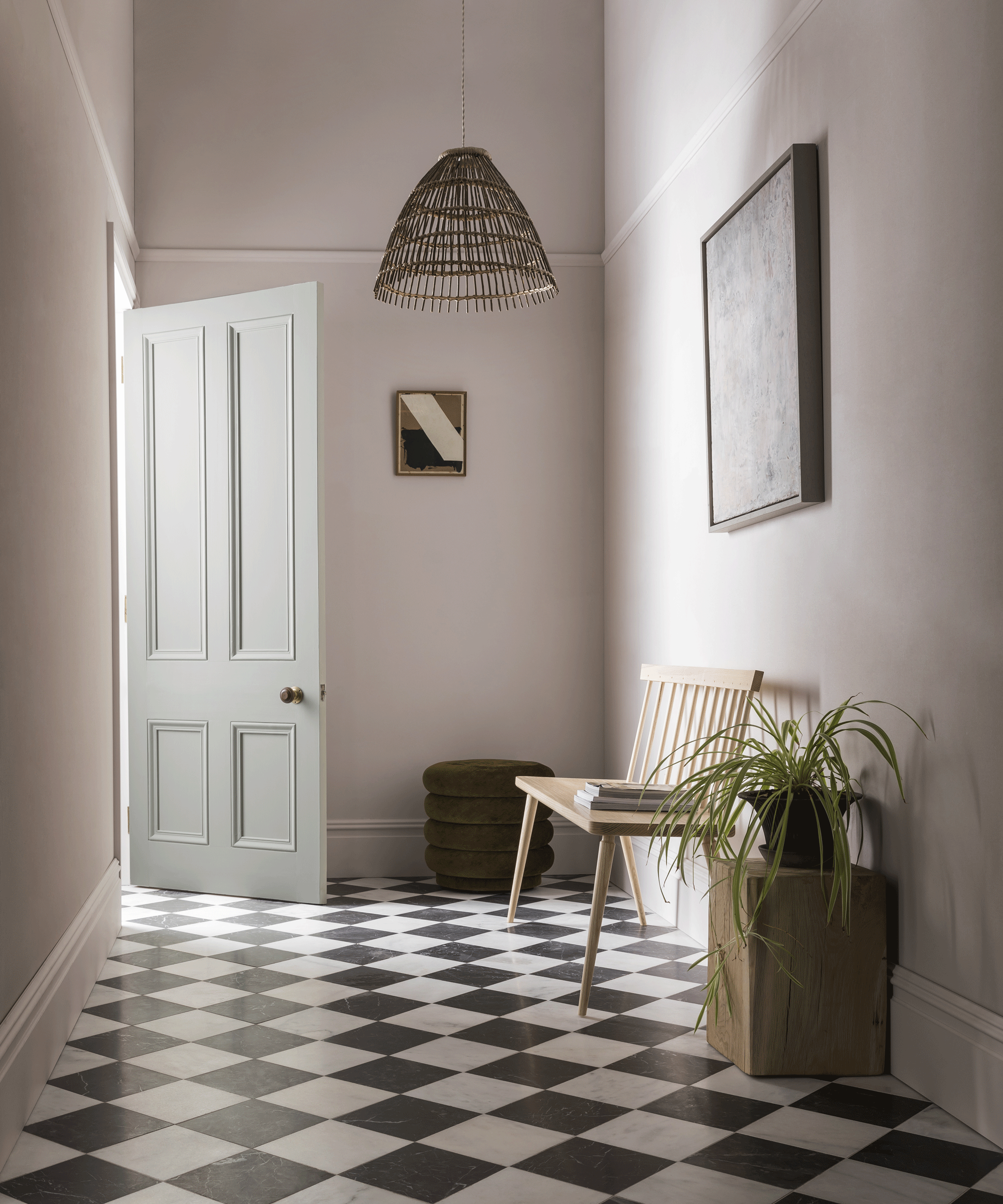 Hallway with neutral walls and chequerboard floor