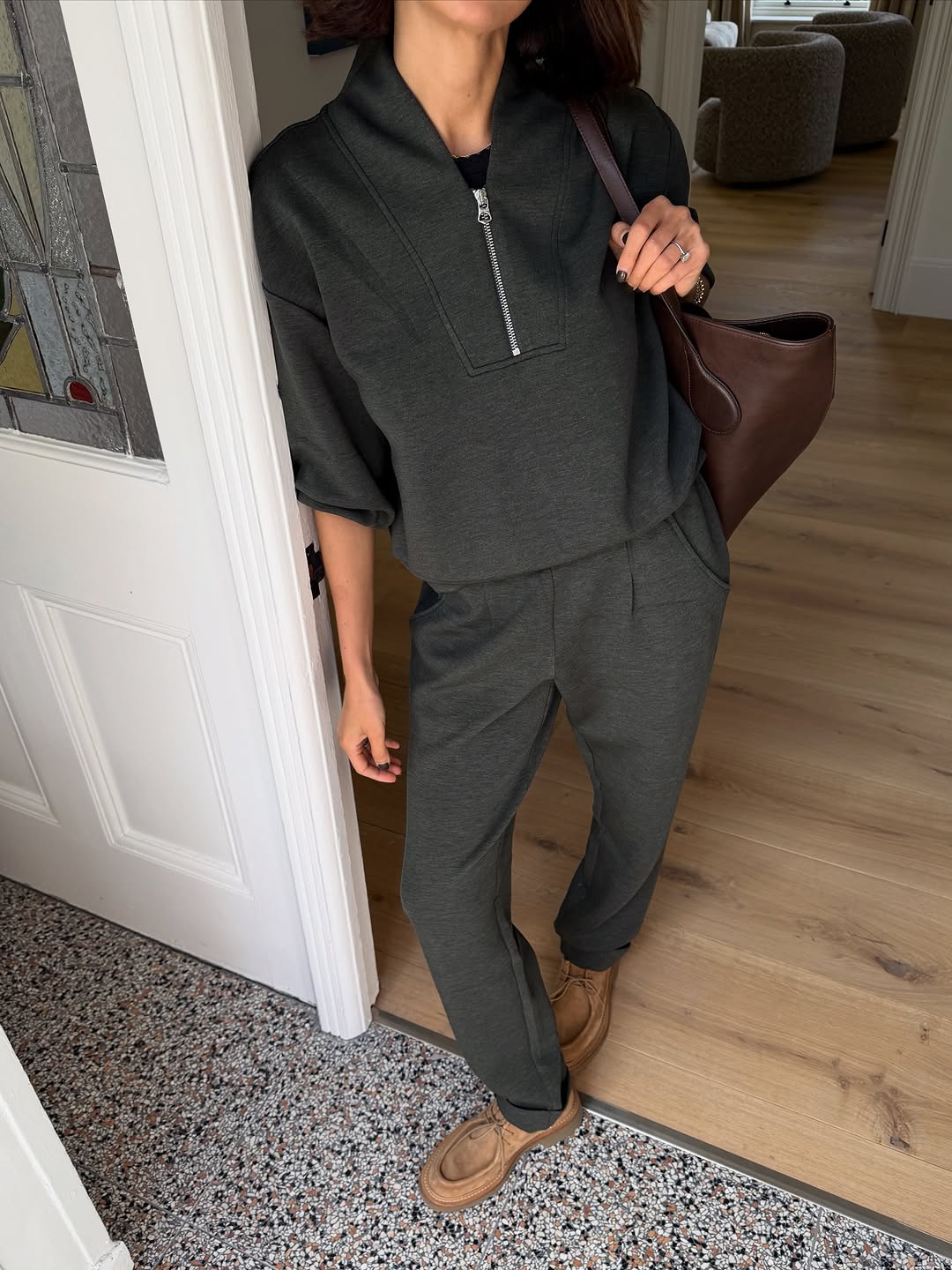 woman wearing fall sweatpant outfit 2025