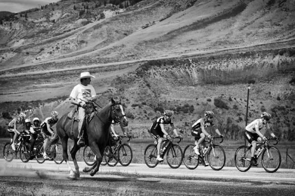 A rider gets along side the race at the USA Pro Cycling Challenge in Colorado.