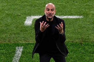 Manchester City manager Pep Guardiola reacts during the UEFA Champions League final football match between Inter Milan and Manchester City at the Ataturk Olympic Stadium in Istanbul, on June 10, 2023