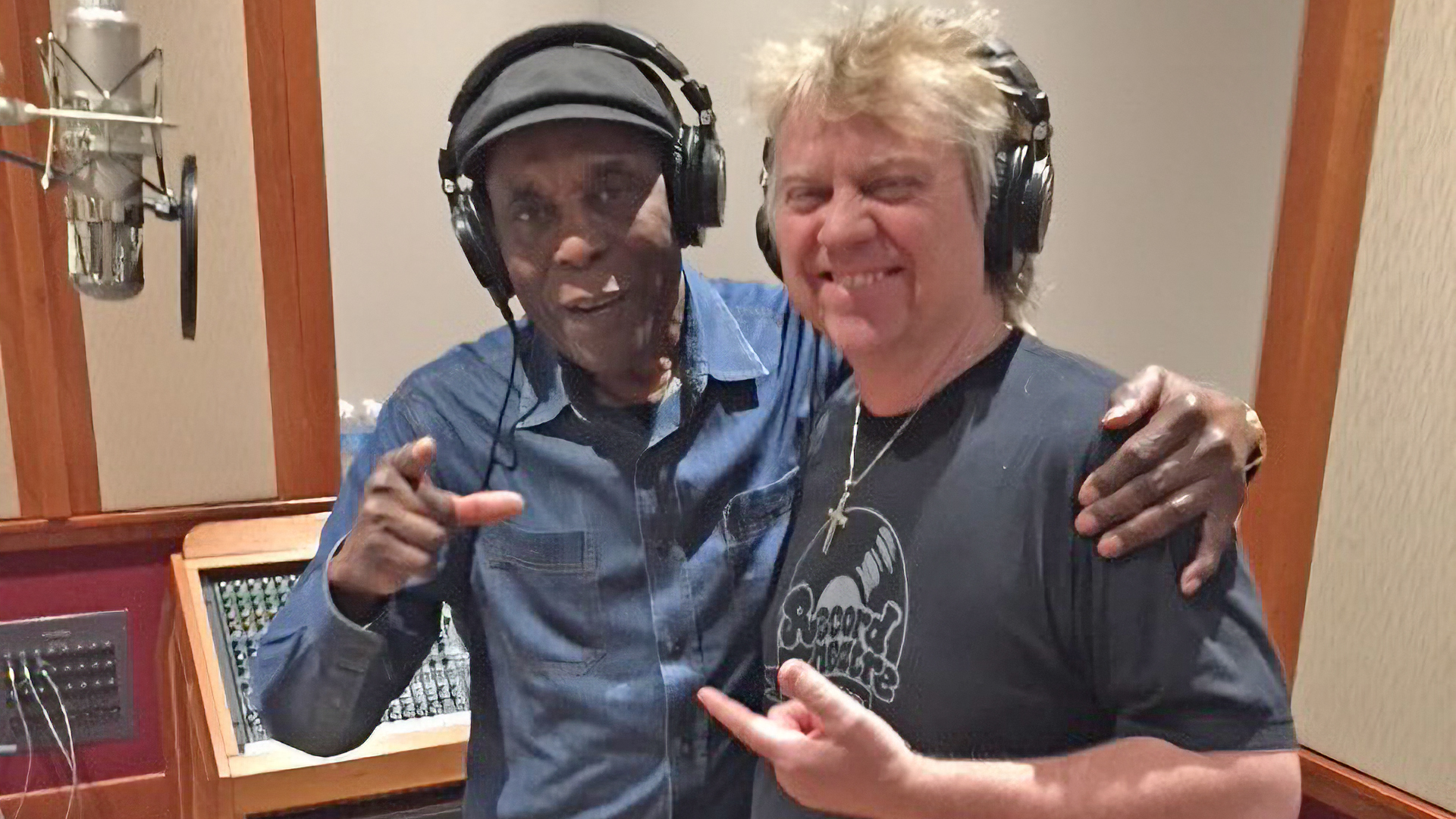 Buddy Guy and producer Tom Hambridge pose for a photo in the studio.