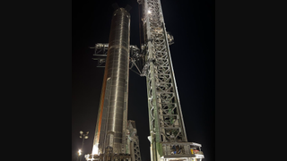 The Super Heavy Booster 7 to support Starship rolls to the launch pad on Aug. 6.