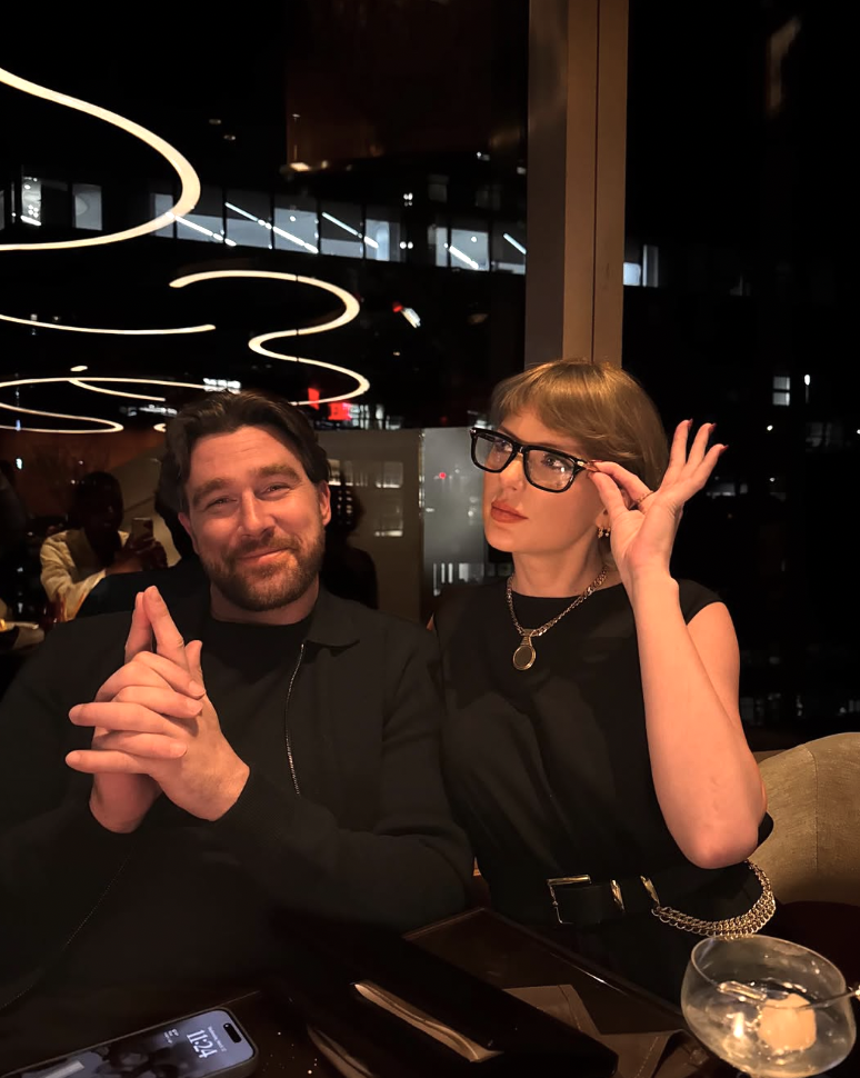 Travis Kelce and Taylor Swift at dinner in matching outfits