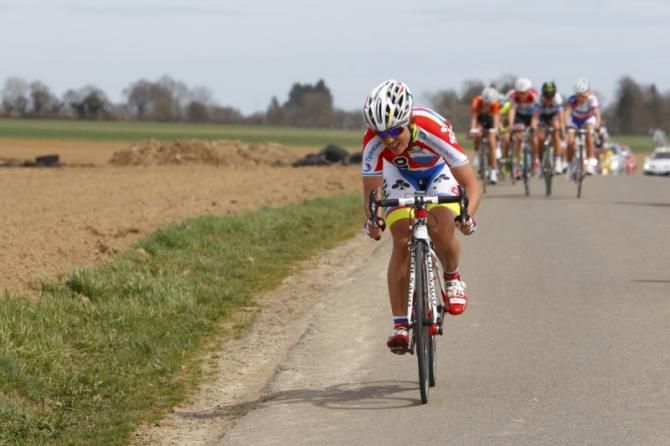 The bunch chase after Colclough