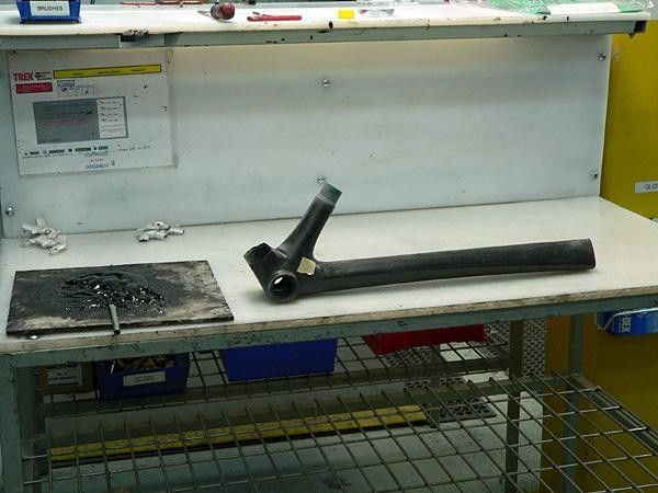 A new Trek Madone frame section ready to be bonded.