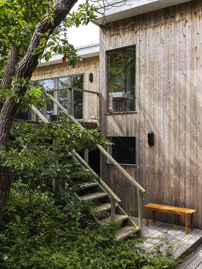 Fire Island tour of house in the pines, timber structure and pool ad warm interiors