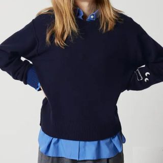 wool sweater in navy with embroidered eye design