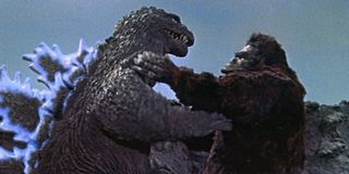 Godzilla and King Kong fighting