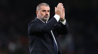 Ange Postecoglou applauds the fans after Tottenham's 2-1 win over Liverpool in September 2023.