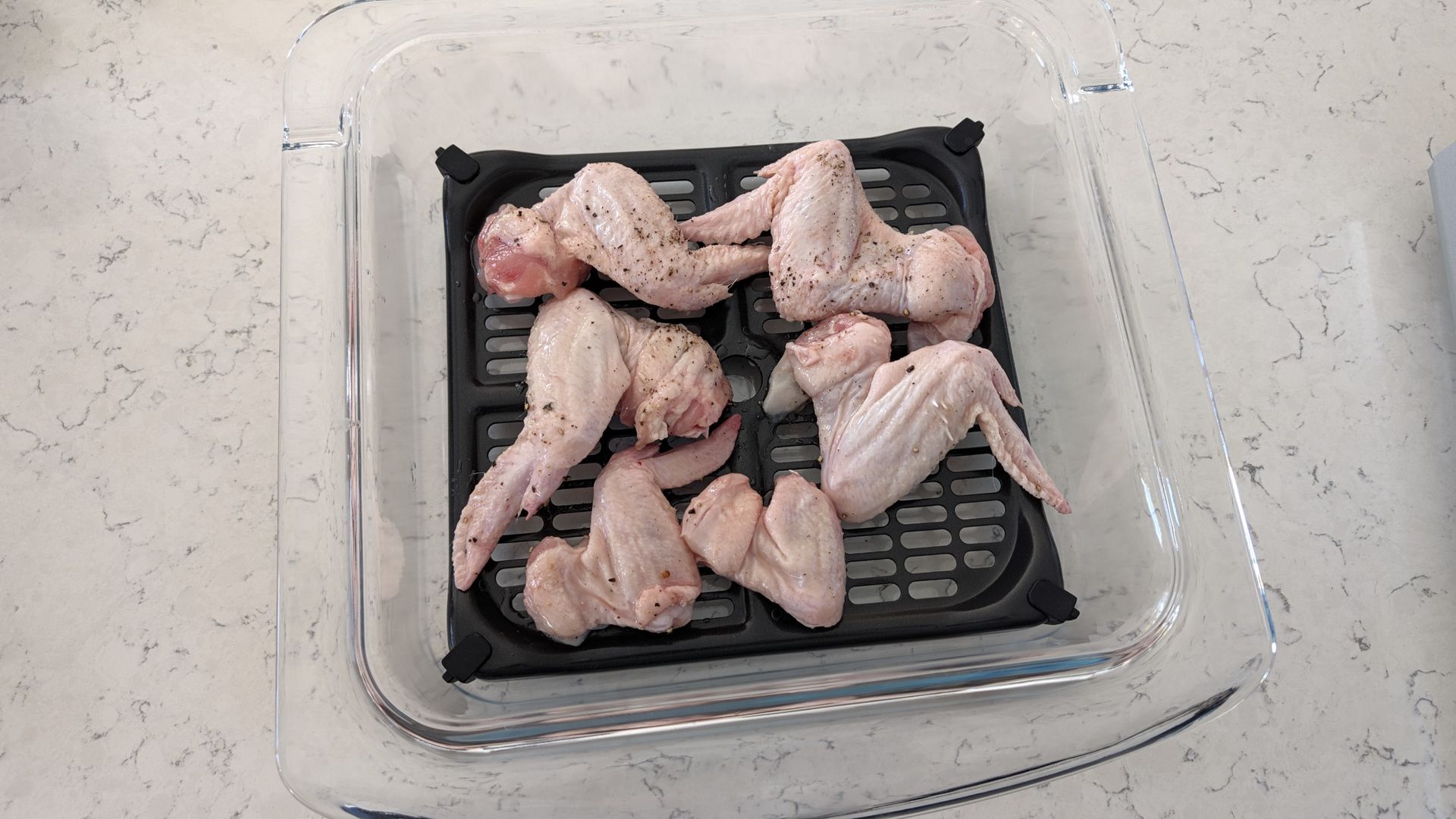 Chicken wings before being cooked using Ninja Crispi Microwave