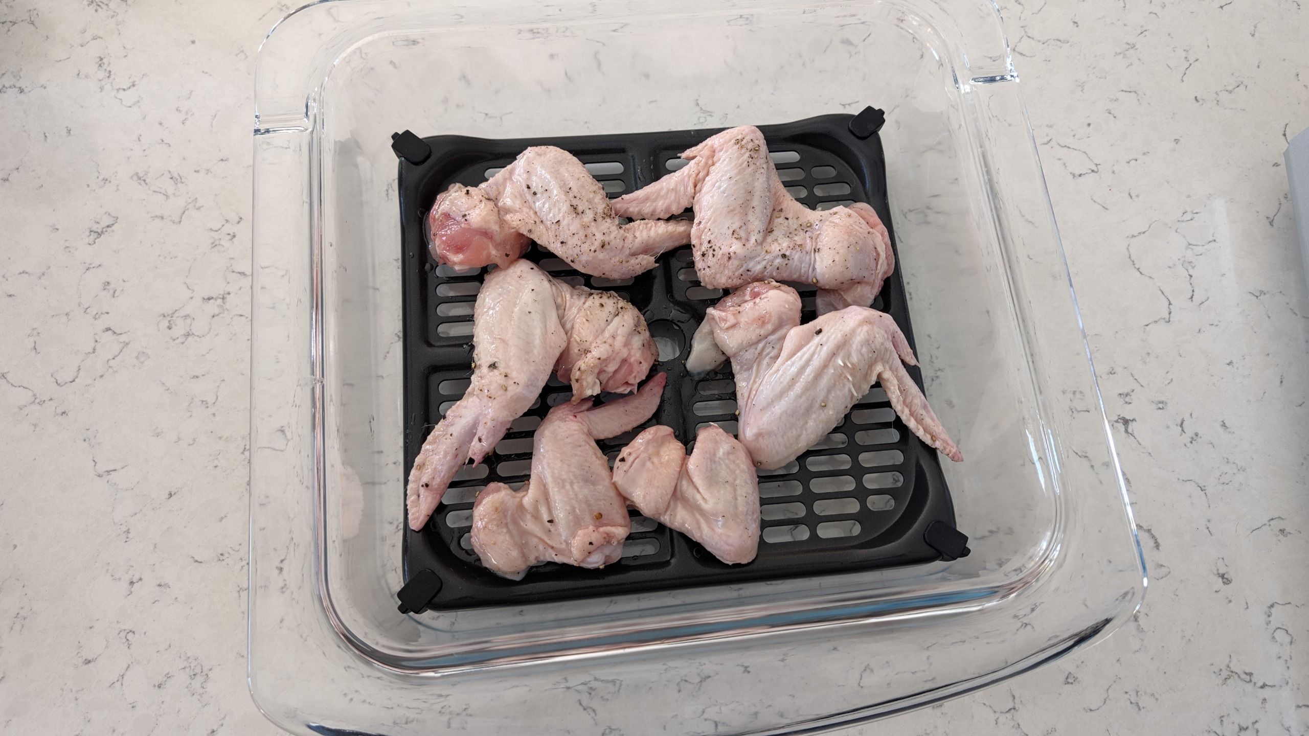 Chicken wings before being cooked using Ninja Crispi Microwave