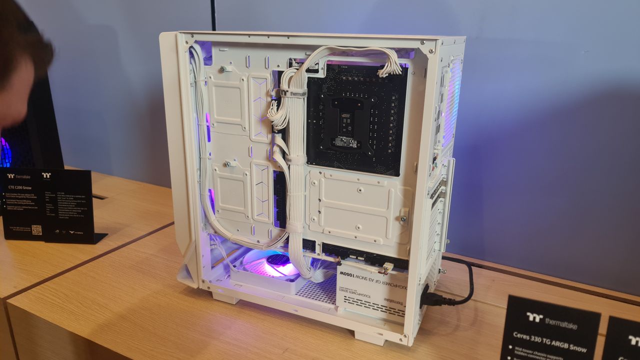 Images of motherboards with no visible connectors for cables.