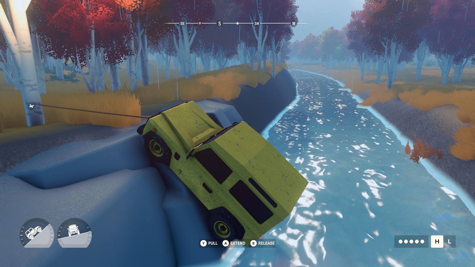 A 4x4 in Over The Hill grapples out of a river by hooking onto a tree