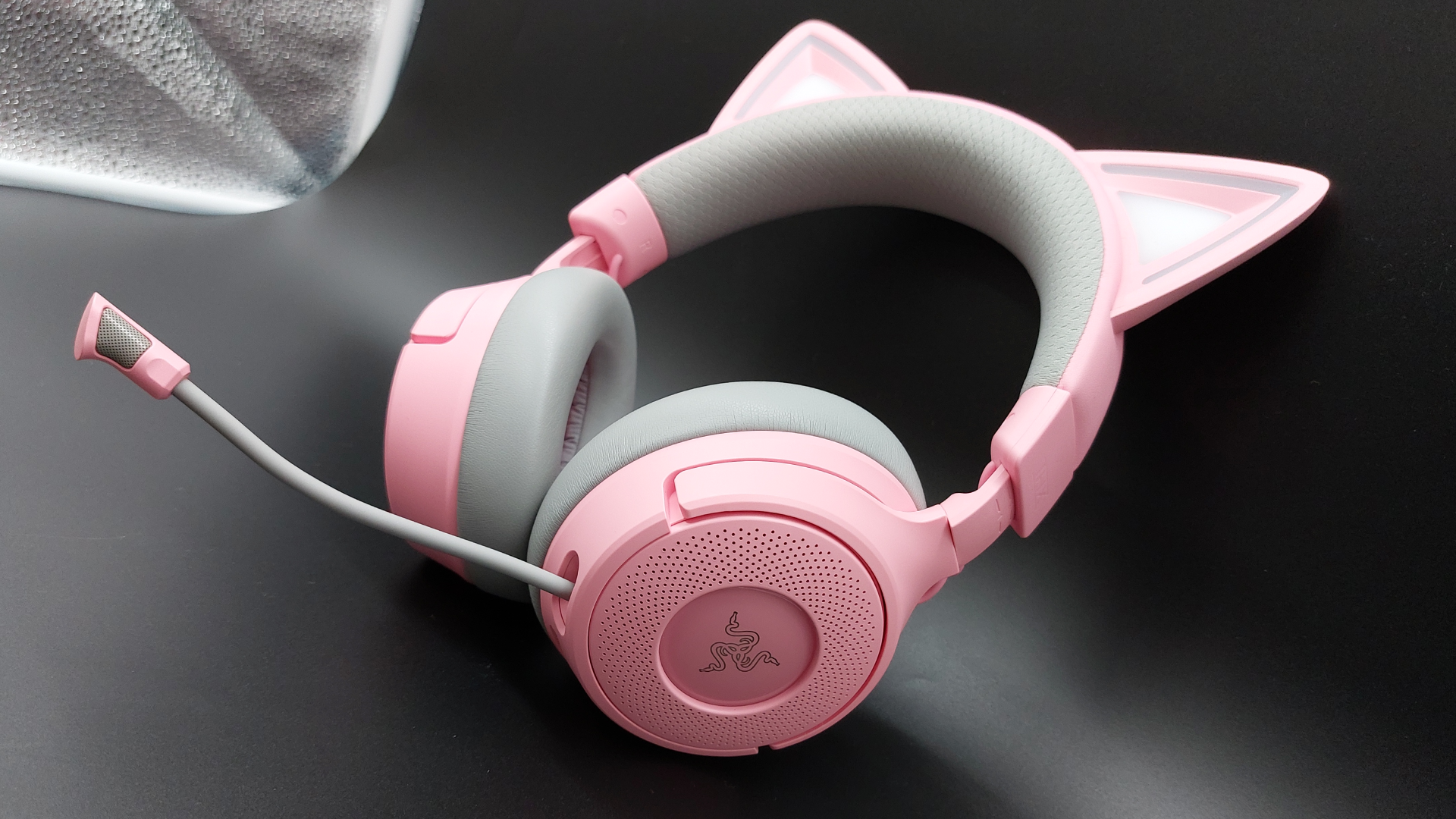 The Kraken Kitty V3 Pro wireless gaming headset in quartz pink.