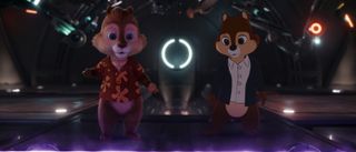 Chip and Dale stand in a high-tech machine in Chip 'n Dale: Rescue Rangers.