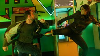 A thug is kicked by Maya Lopez in an arcade in Marvel Studios' Echo TV series