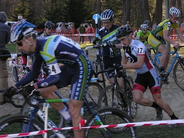 The elite men take on the sand pit.