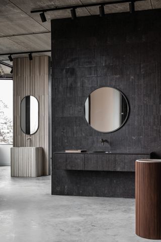 A bathroom in brown wooden textures, charcoal and gray