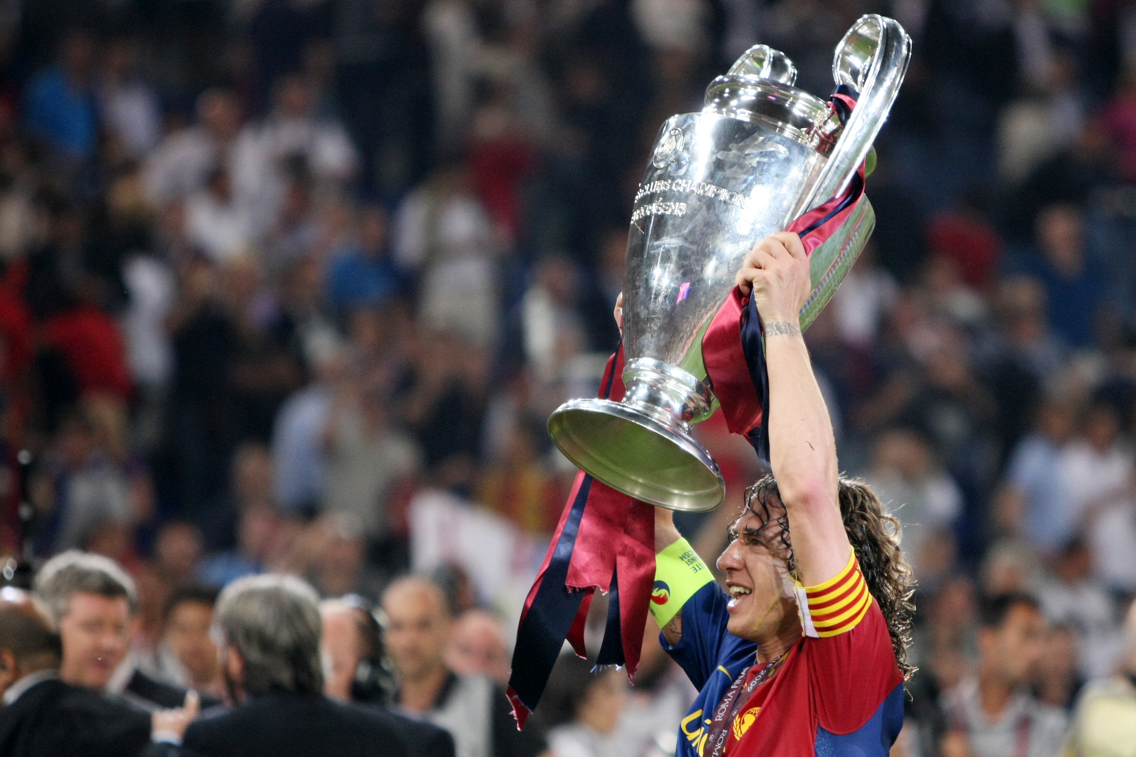 Carles Puyol lifts the Champions League trophy after Barcelona's win over Manchester United in the 2009 final.