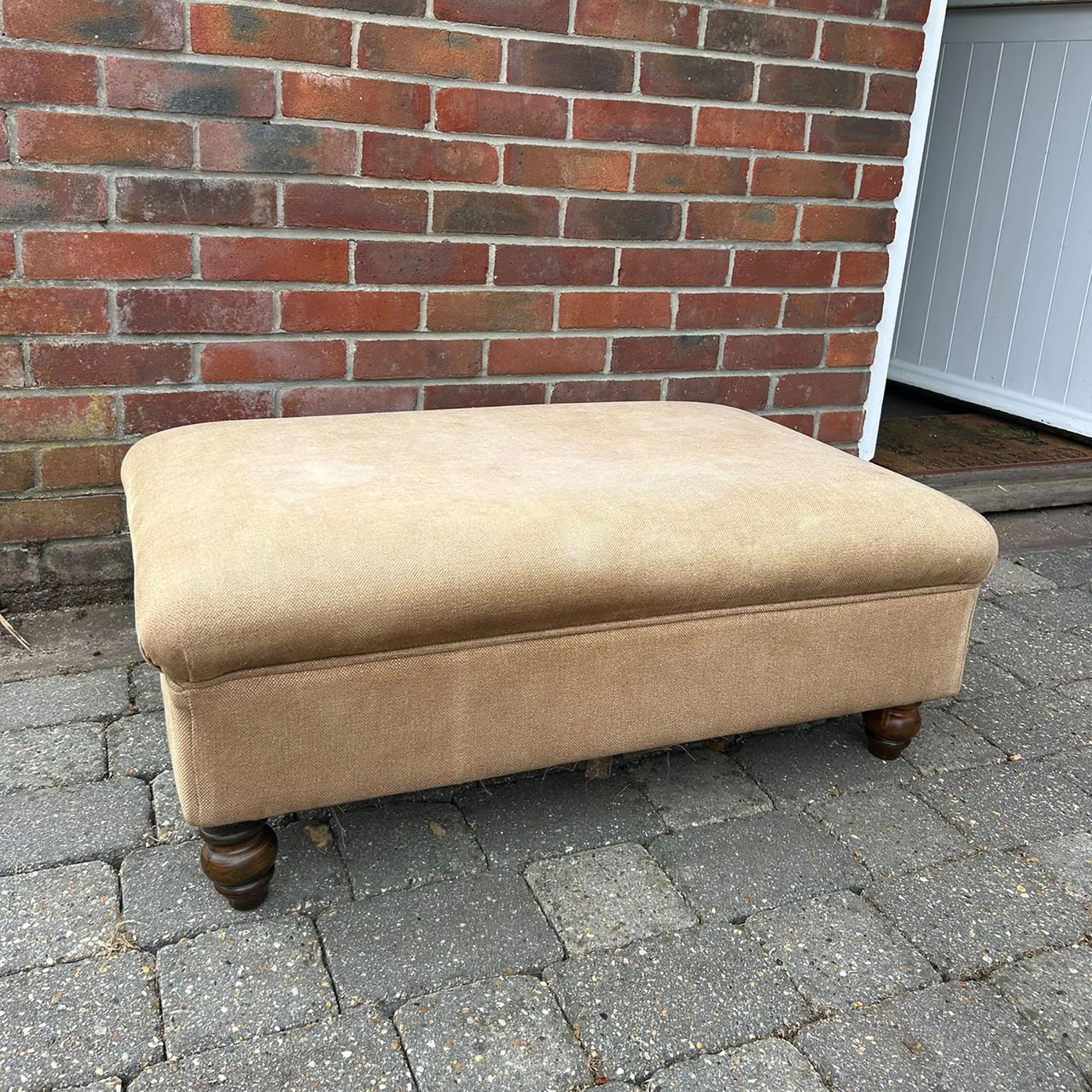 Upholstered footstool before and after