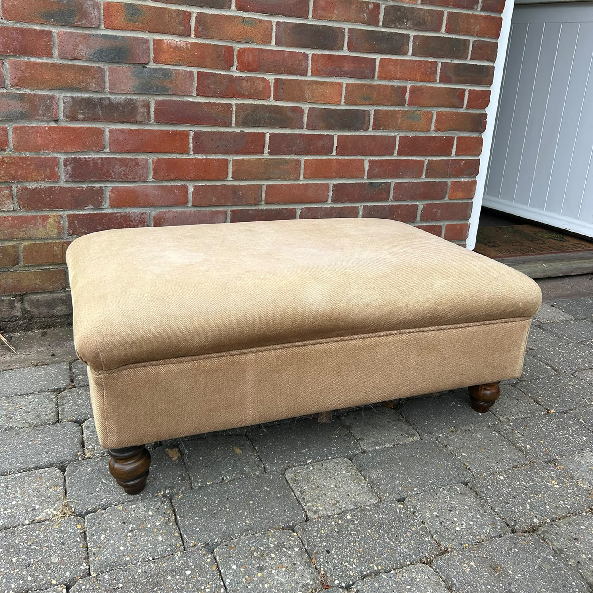Upholstered footstool before and after