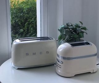 KitchenAid Pro Line 2-Slice Toaster next to the Smeg four slice toaster