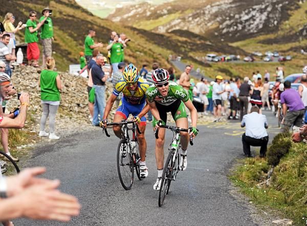 Connor McConvey (An Post-Sean Kelly), right, and new race leader Nicolas Baldo (Atlas Jakroo) on the Mamore Gap climb