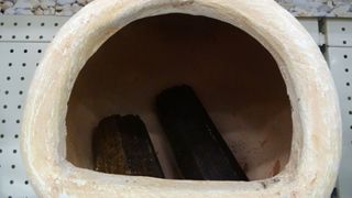 picture of the inside of a clay chiminea