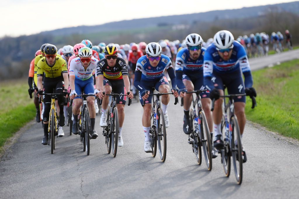 LES MUREAUX FRANCE MARCH 03 LR Sandy Dujardin of France and Team TotalEnergies and Remco Evenepoel of Belgium and Team Soudal Quick Step compete during the 82nd Paris Nice 2024 Stage 1 a 1577km stage from Les Mureaux to Les Mureaux UCIWT on March 03 2024 in Les Mureaux France Photo by Alex BroadwayGetty Images