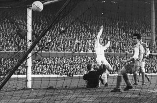 Alfredo Di Stefano celebrates after scoring Real Madrid's second goal in the 7-3 win over Eintracht Frankfurt in the 1960 European Cup final.