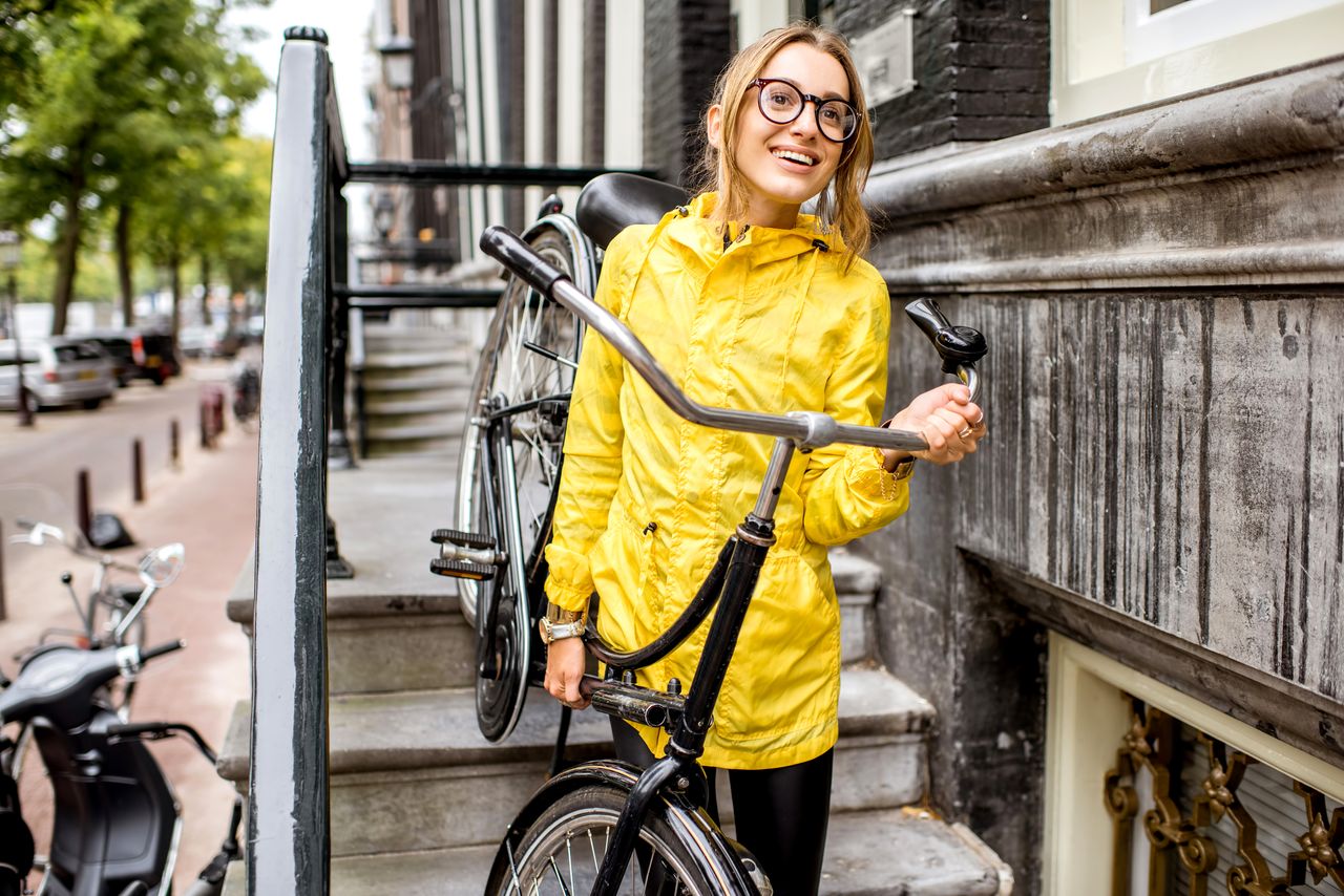 A woman in a raincoat.