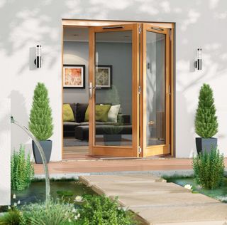timber bi-fold doors in contemporary extension by B&Q