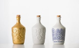 Gold relief, White relief and Gosu porcelain bottles