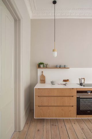 wooden kitchen cabinet ideas with a corian worktop