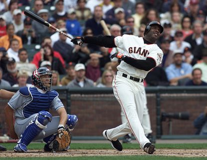 San Francisco Giants' slugger Barry Bonds hitting a home run in 2001.