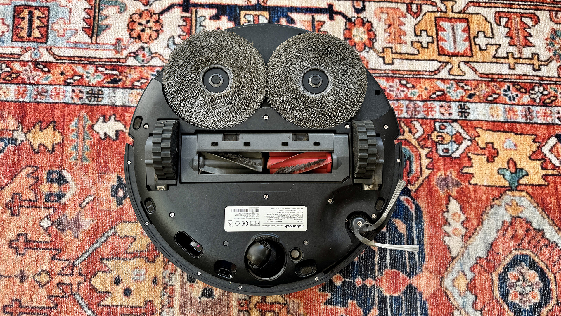 Roborock Saros 10R robot vacuum flipped over to show underside