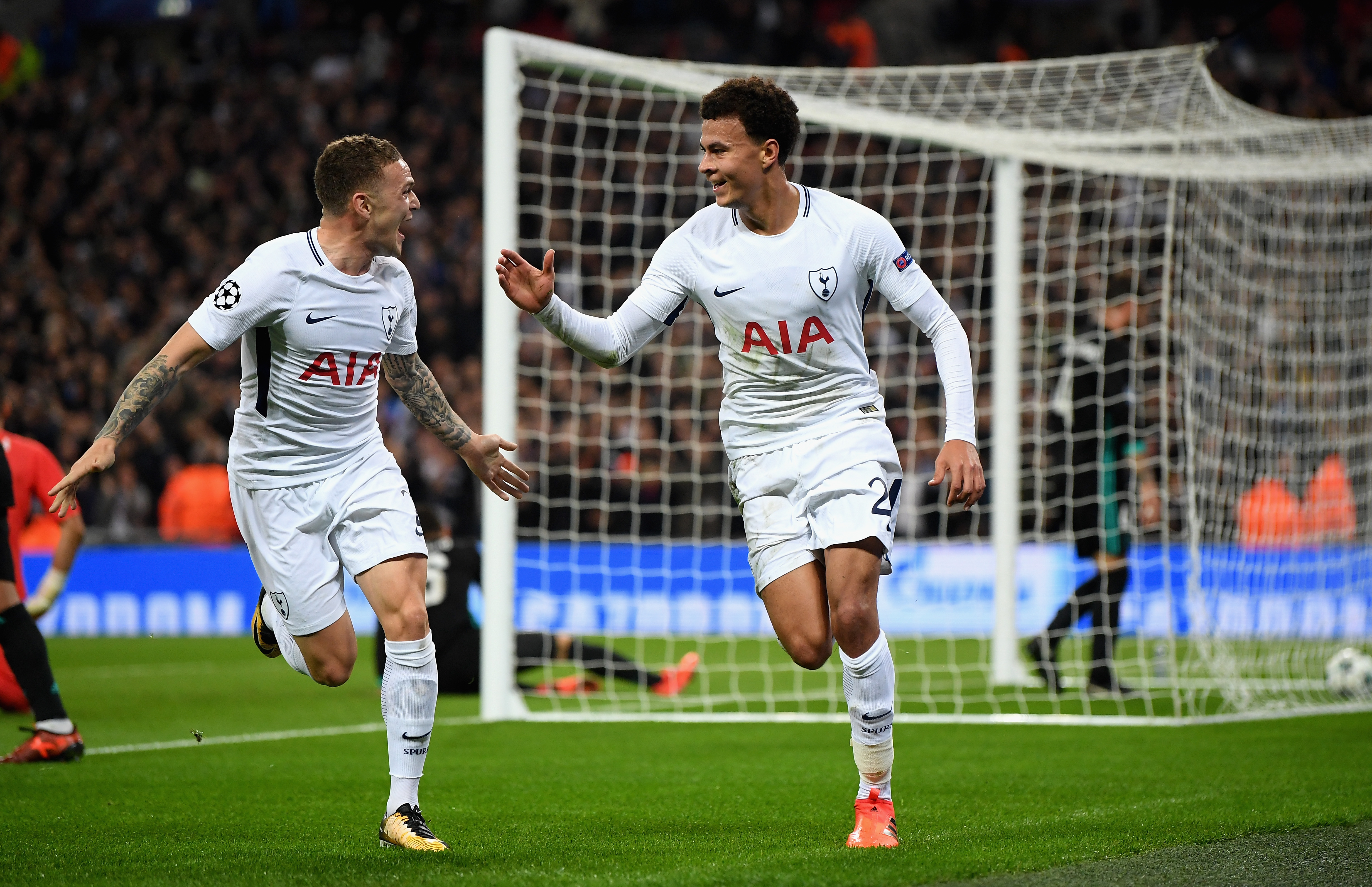 Dele Alli celebrates with Kieran Trippier after scoring against Real Madrid at Wembley in 2017.