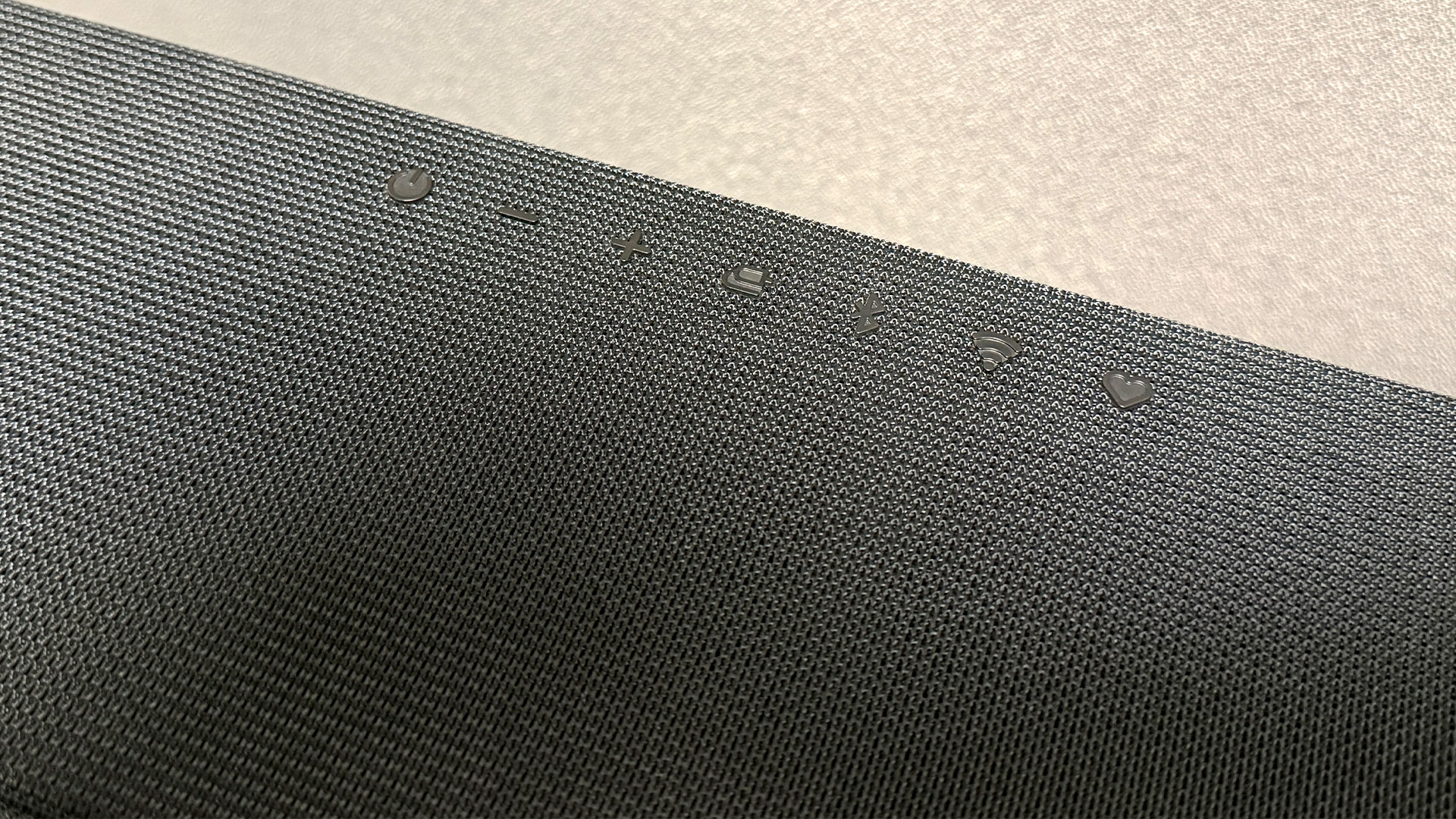 LG Sound Suite H7 soundbar, detail of controls on top of bar