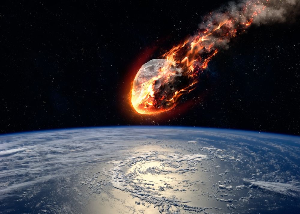 A meteor glowing as it enters the Earth&#039;s atmosphere.