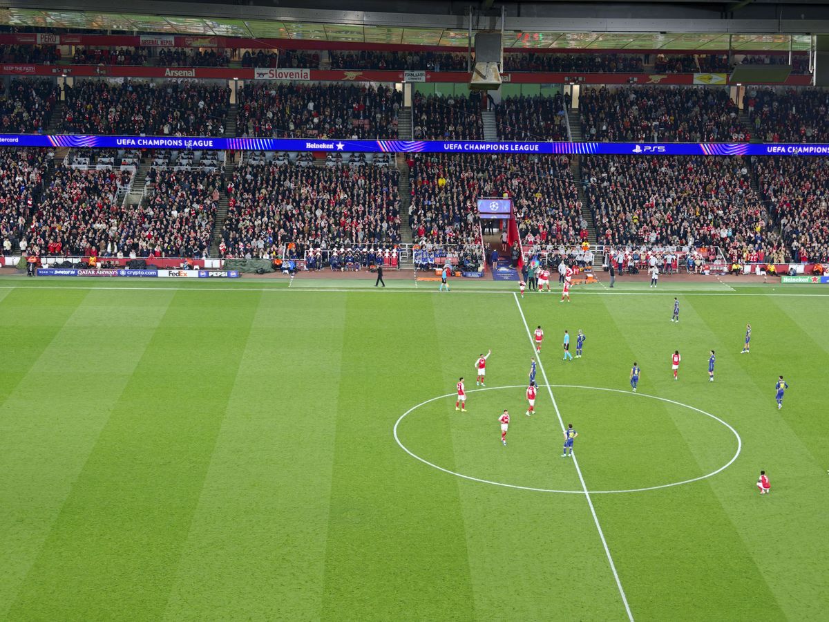 Action photos during a Champions League soccer match at Arsenal's Emirates stadium, taken with the Oppo Find X9 Ultra and teleconverter lens