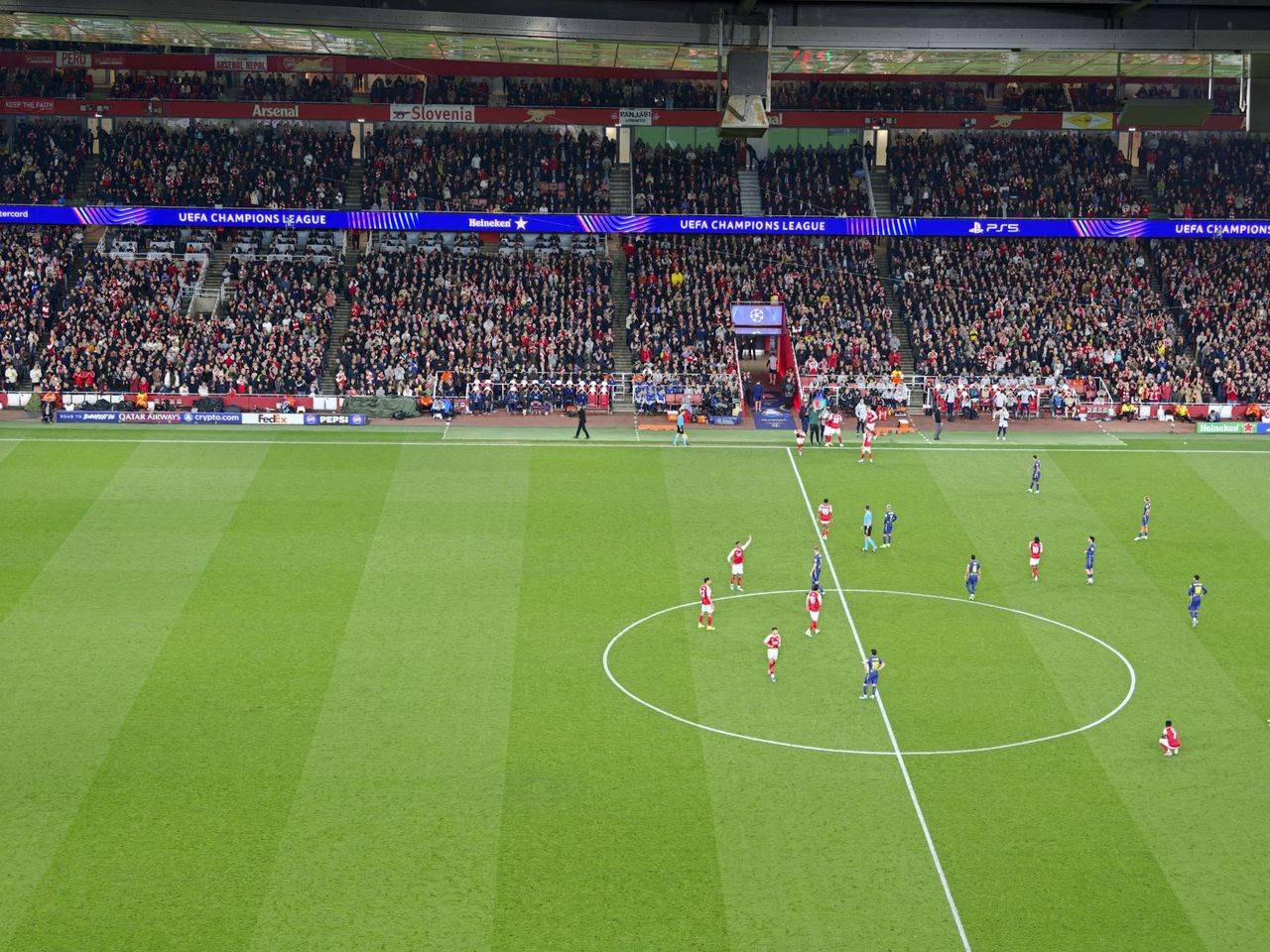 Action photos during a Champions League soccer match at Arsenal's Emirates stadium, taken with the Oppo Find X9 Ultra and teleconverter lens