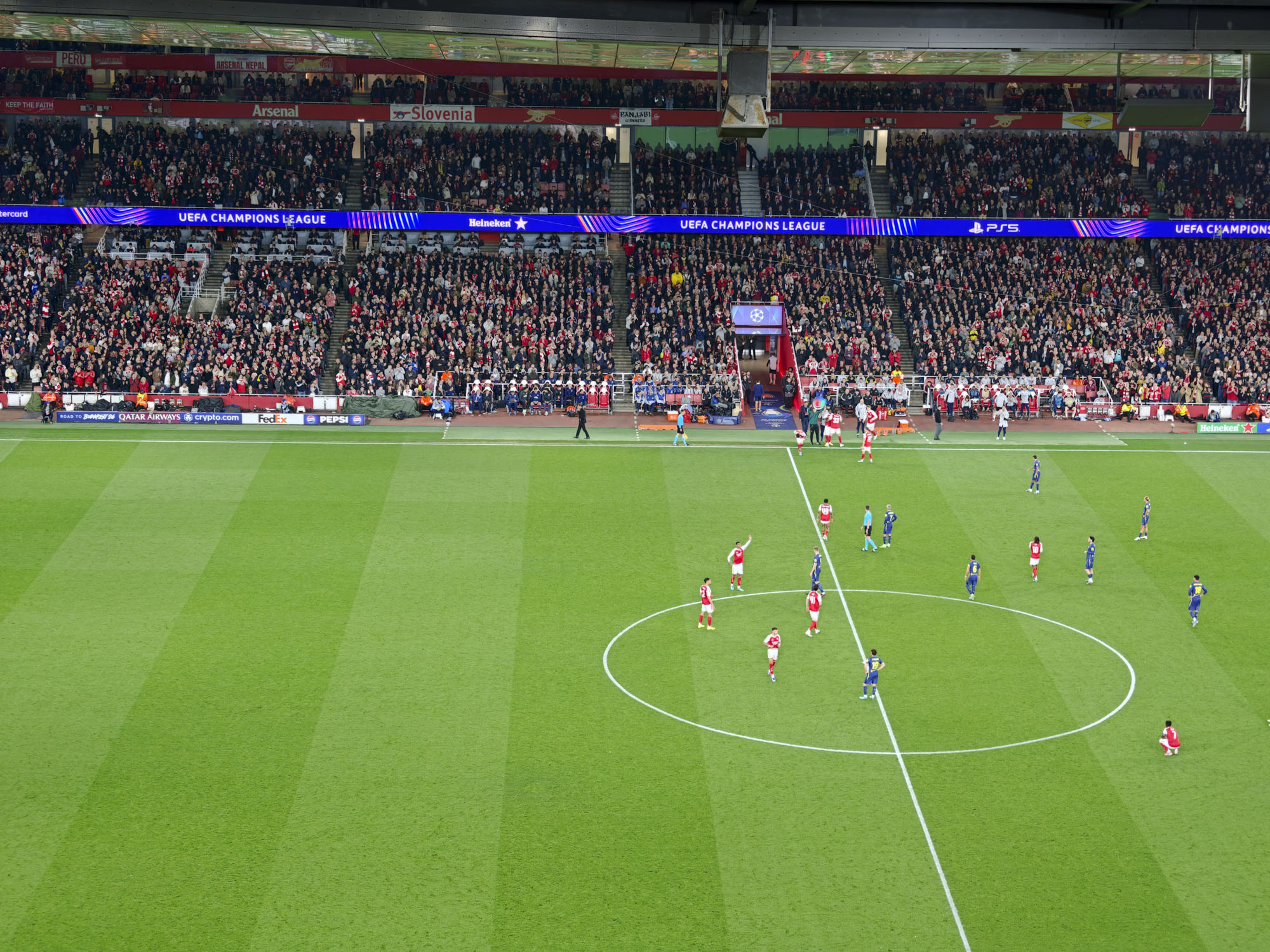 Action photos during a Champions League soccer match at Arsenal's Emirates stadium, taken with the Oppo Find X9 Ultra and teleconverter lens