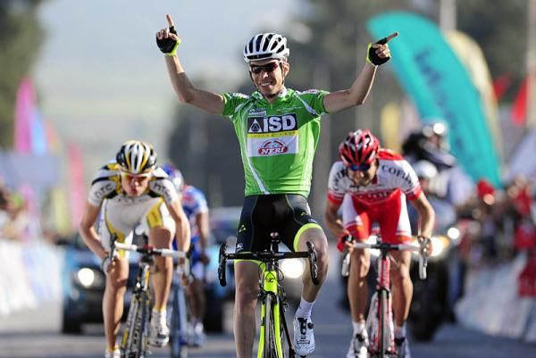 Giovanni Visconti (ISD - Neri) celebrates his victory over Tejay Van Garderen (HTC - Columbia) and David Moncouti&eacute; (Cofidis).