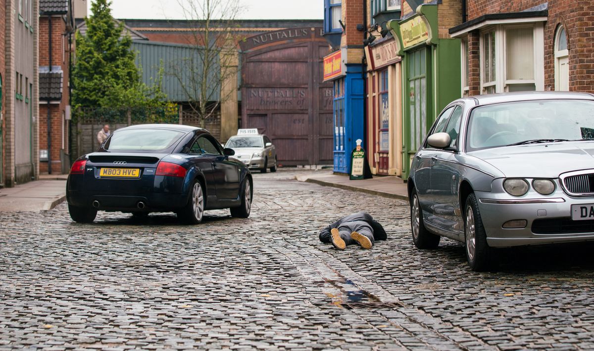 Coronation Street spoilers Nick Tilsley lies on the cobbles.