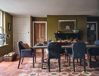 evlet dining chairs in a green dining room by Oka