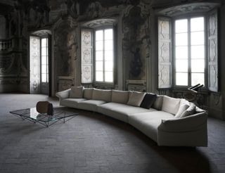 large gray modern sofa in a grand living room