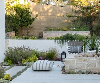 tiered paved modern yard by Living Gardens