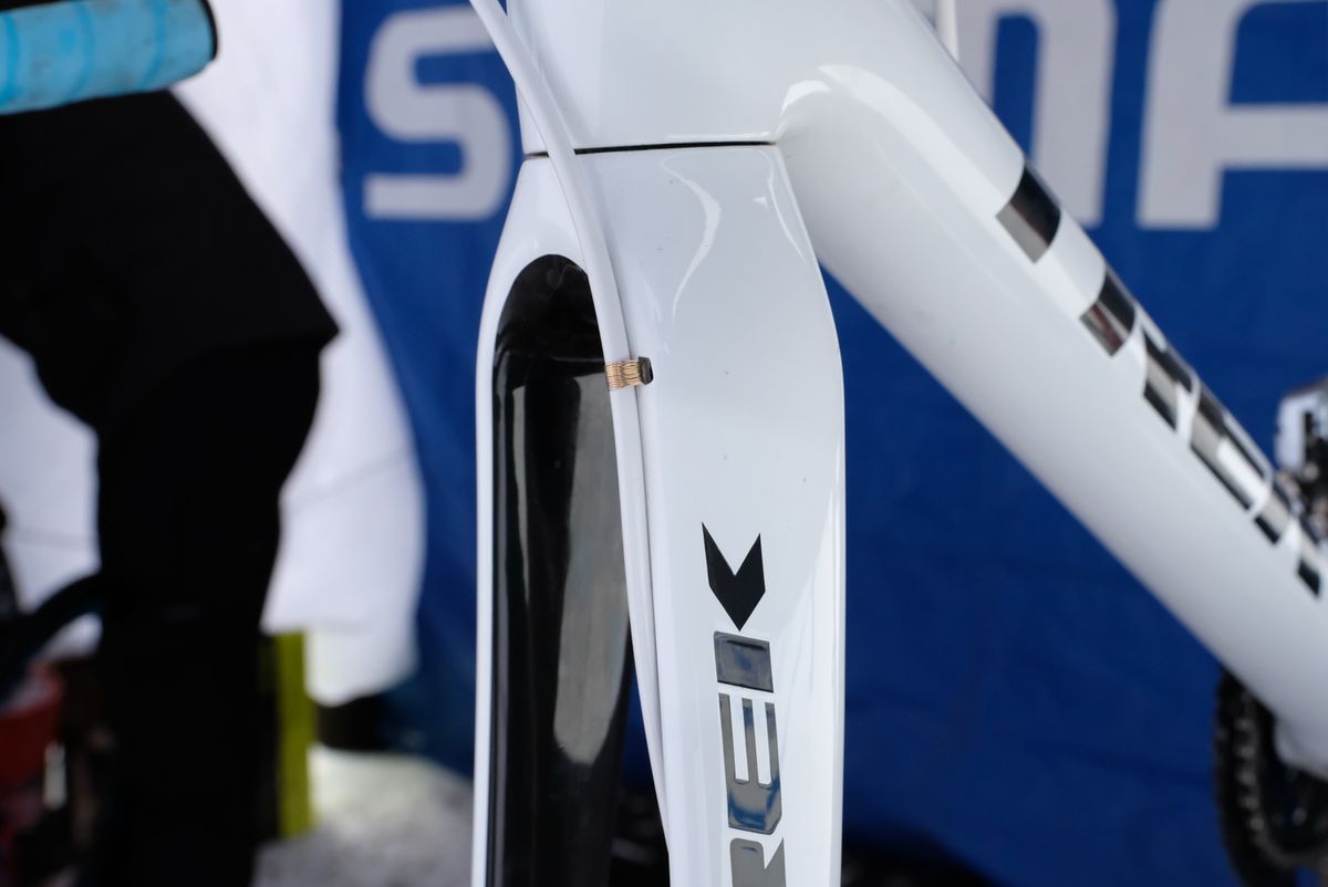 Compton's cables aren't zip-tied, they're attached with thin wire to keep them secure on the fork
