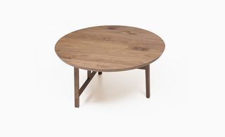 Circular light wooden coffee table